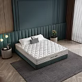 Double Bed with Quilted Mattress and Green Upholstered Headboard in Modern Bedroom