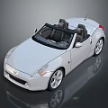 White Modern Convertible Sports Car With Black Soft Top Two Seats And Silver Wheels
