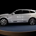 White Jaguar SUV With Modern Design Sleek Exterior On Circular Display Platform