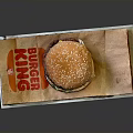 Burger King Hamburger With Sesame Seed Bun Fresh Lettuce And Tomato On Wrapper
