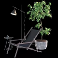 Cozy Lounge Chair With Floor Lamp Side Table And Potted Tree