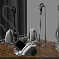 Various Styles of Household Vacuum Cleaners Displayed on Indoor Wooden Floor