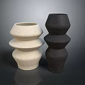 Modern Sculptural Vases in Beige and Black with Layered Stacked Design and Textured Granular Surface