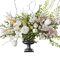 Elegant Flower Arrangement in Black Vase With White Pink Flowers Green Leaves and Decorative Branches