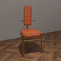 Modern Leather Dining Chair With Brass Legs Button Tufted Back On Herringbone Wooden Floor