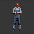 Worker In Blue Overalls Gray T-shirt Red Cap Knee Pads Standing Against Gray Background