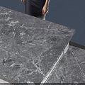 Modern Reception Desk With Marble Top And Potted Plant In Blue Welcome Area
