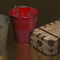 Gray And Red Metal Buckets With Wooden Crate On Brown Surface