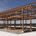 Industrial Construction Equipment Wooden Structural Frame with Beams Columns Concrete Foundations and Blue Sky