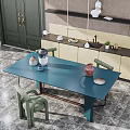 Blue Dining Table Set with Green Chairs and Decorative Items on Background Shelf