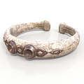Textured Stone Like Decorative Bracelet With Carved Patterns And Bronze Round Accents