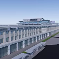 Modern Train Station Exterior With Circular Roof Design And Surrounding Roadways