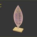 Golden Leaf Shaped Furniture Decor Piece With Intricate Veins And Square Base
