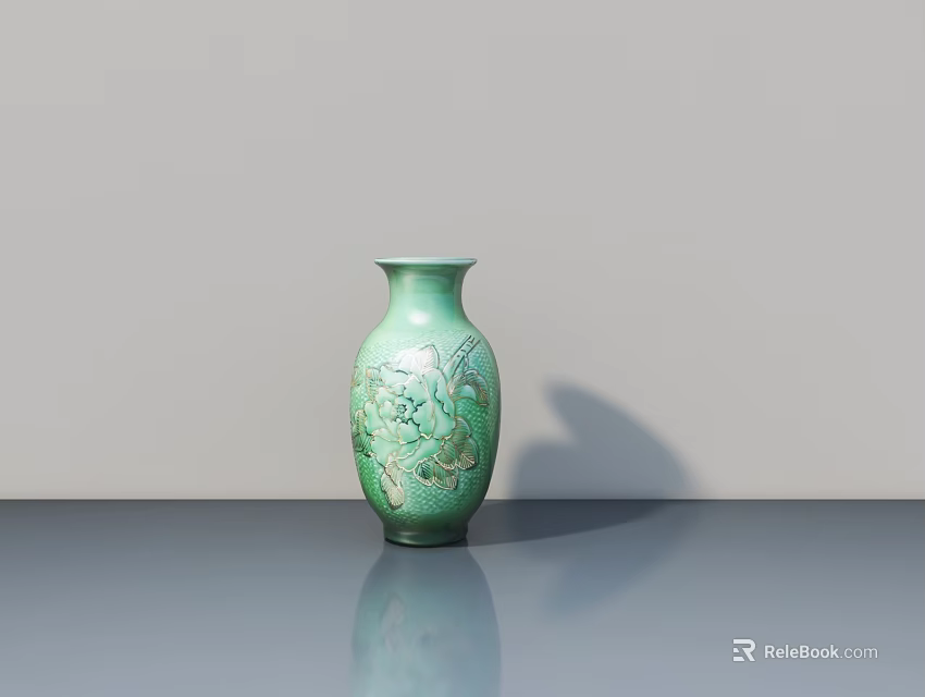 Green Ceramic Vase with Intricate Floral Patterns on Gray Table and Light Gray Wall 3d model 