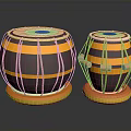 Household Items Two Drums With Yellow Brown Stripes White Top Blue Dot And Orange Balls