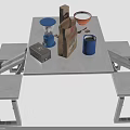 Food Setup On Outdoor Metal Table With Benches Brown Paper Bag Orange Bowl Blue Cup