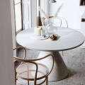 Modern Open Kitchen and Dining Area with White Cabinets Island Counter and Decorative Painting