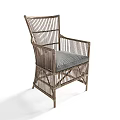 Rattan Leisure Chair with Gray Padded Seat and Armrests for Comfortable Relaxation