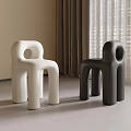Modern Single Chair Design In White And Black With Round Hole For Minimalist Interior