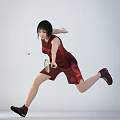 Active Woman Playing Badminton In Red Sportswear Running And Hitting Shuttlecock With Racket