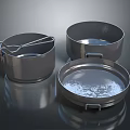 Three Piece Stainless Steel Cookware Set With Handles Mixing Tool And Shiny Reflective Surface