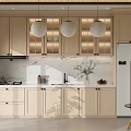 Modern Kitchen Interior Design With Beige Cabinets Marble Countertop Pendant Lights And Green Plants