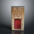 Ornate Architectural Facade Featuring Intricate Carved Details And Red Wooden Door
