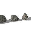Four Natural Textured Stones With Different Shapes On Gray Surface