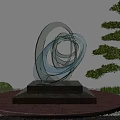 Transparent Glass Garden Sculpture With Twisted Circular Design Black Stone Base And Green Pine Tree 3d model