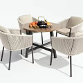 Modern Outdoor Table with Four Woven Chairs and Fruits Tea Set on Top