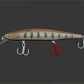 Fish Shaped Fishing Lure With Red Brown Body Black Stripes Yellow Eyes And Metal Hooks