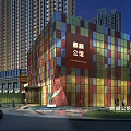 Modern Sales Office Building With Colorful Glass Curtain Wall Evening Lighting And High-rise Background
