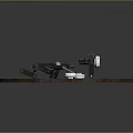 Two Black Long Guns on a Wooden Round Platform with Blue and White Peeling Paint