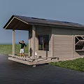 Wooden House With Solar Panel Roof And Wooden Deck By Waterfront