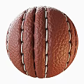 Close Up View Of Brown Leather Ball With White Stitches And Textured Surface
