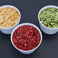 Three White Bowls of Colorful Food with Red Green and Yellow Textures