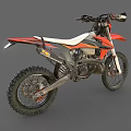 Orange and Black Motocross Motorcycle With Large Off Road Tires And White Seat