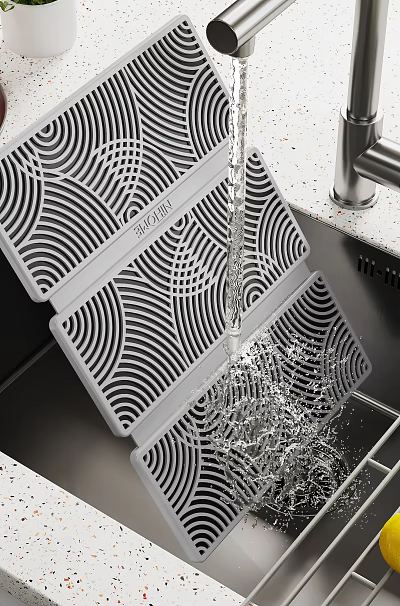 Kitchen Sink Featuring Flowing Water And Black And White Patterned Dish Drying Mat 3d model