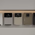 Various Colored Modern Household Appliances Featuring Digital Displays Arranged On Kitchen Shelf