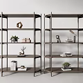 Two Modern Bookcases With Multitiered Shelves Holding Books Decorative Items Plants And Table Lamp