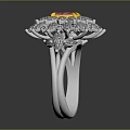 Elegant Ring Design Featuring Pink Center Gemstone With Blue Surrounding Stones In Silver Setting