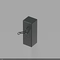 Black Cube Shaped Object With Ring Handle And Surface Holes On Light Blue Background
