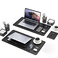 Organized Office Desk Setup With Black Desk Pads Laptops Phones Coffee Cups And Stationery