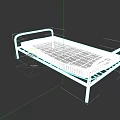 Single Bed with Metal Frame and Red Stained Mattress Surface
