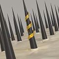 Black Spikes With Yellow Striped Band On Textured Beige Surface