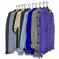 Various Colorful Clothes with Different Styles and Patterns Hanging on Hangers