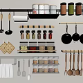 Organized Kitchen Wall With Hanging Pans Spatulas And Glass Jars For Spices