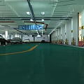 Modern Indoor Parking Lot with Green Floor Parked Cars Direction Signs and Ceiling Lights