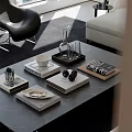 Modern Coffee Table with Stacked Books Decorative Balls Glass Vase and Tray