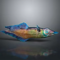 Colorful Squid Sculpture with Blue Fins Green Purple Body Large Eyes on Gray Background Reflection